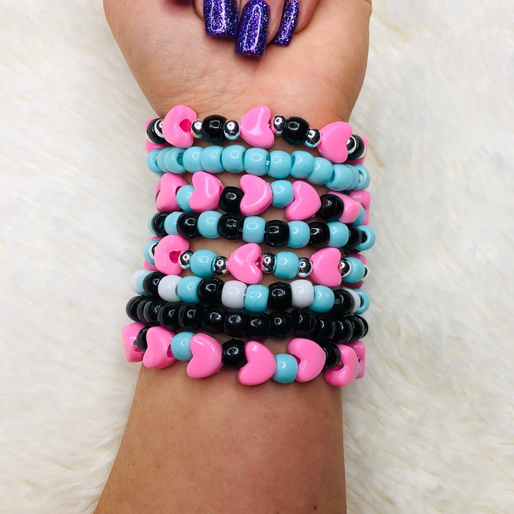 Queen of Hearts “Maiden” Kandi Singles